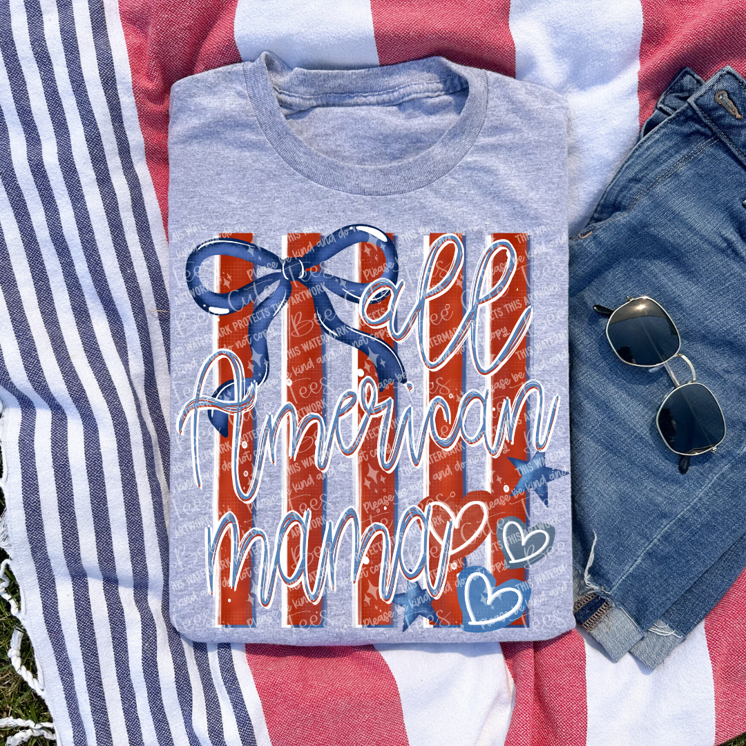 Gray t-shirt with 'All American Mama' design on a red, white, and blue striped background.