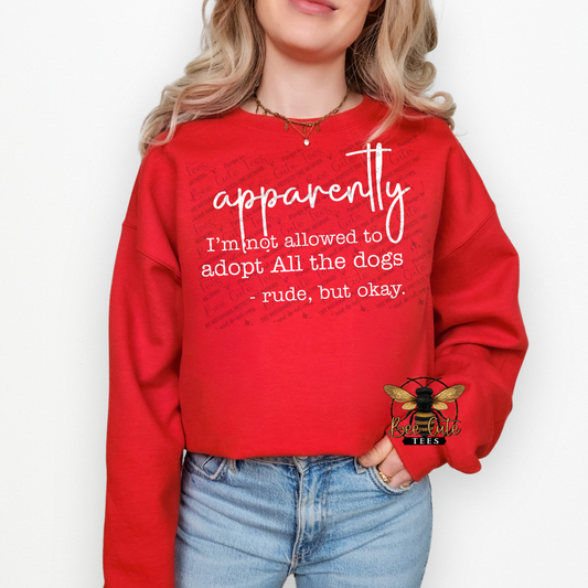 Person wearing a red sweatshirt with text, standing against a white background