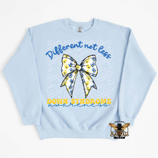 Light blue sweatshirt with a yellow and blue bow graphic and text on a white background