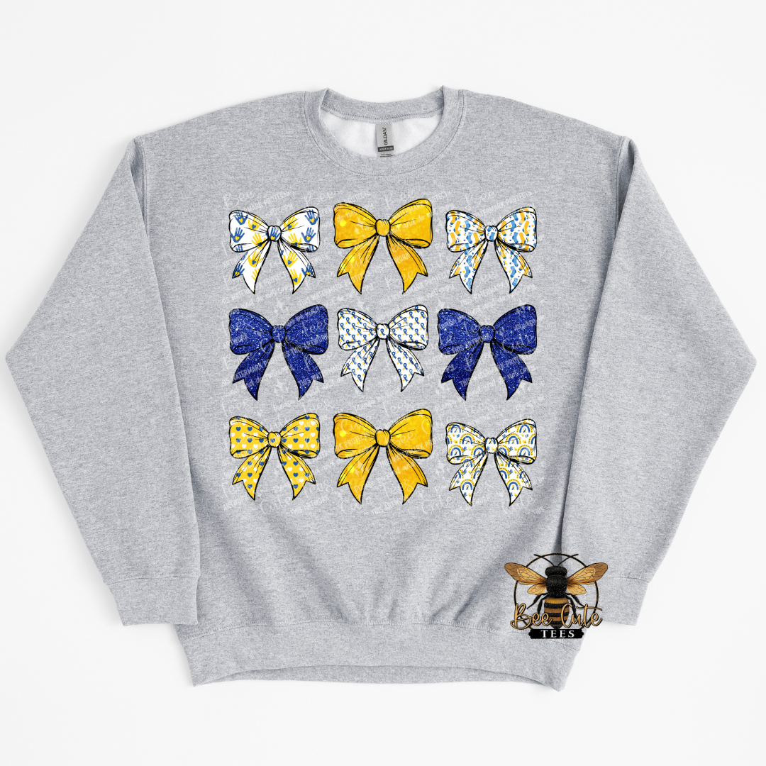 Gray sweatshirt with colorful bow designs on a white background