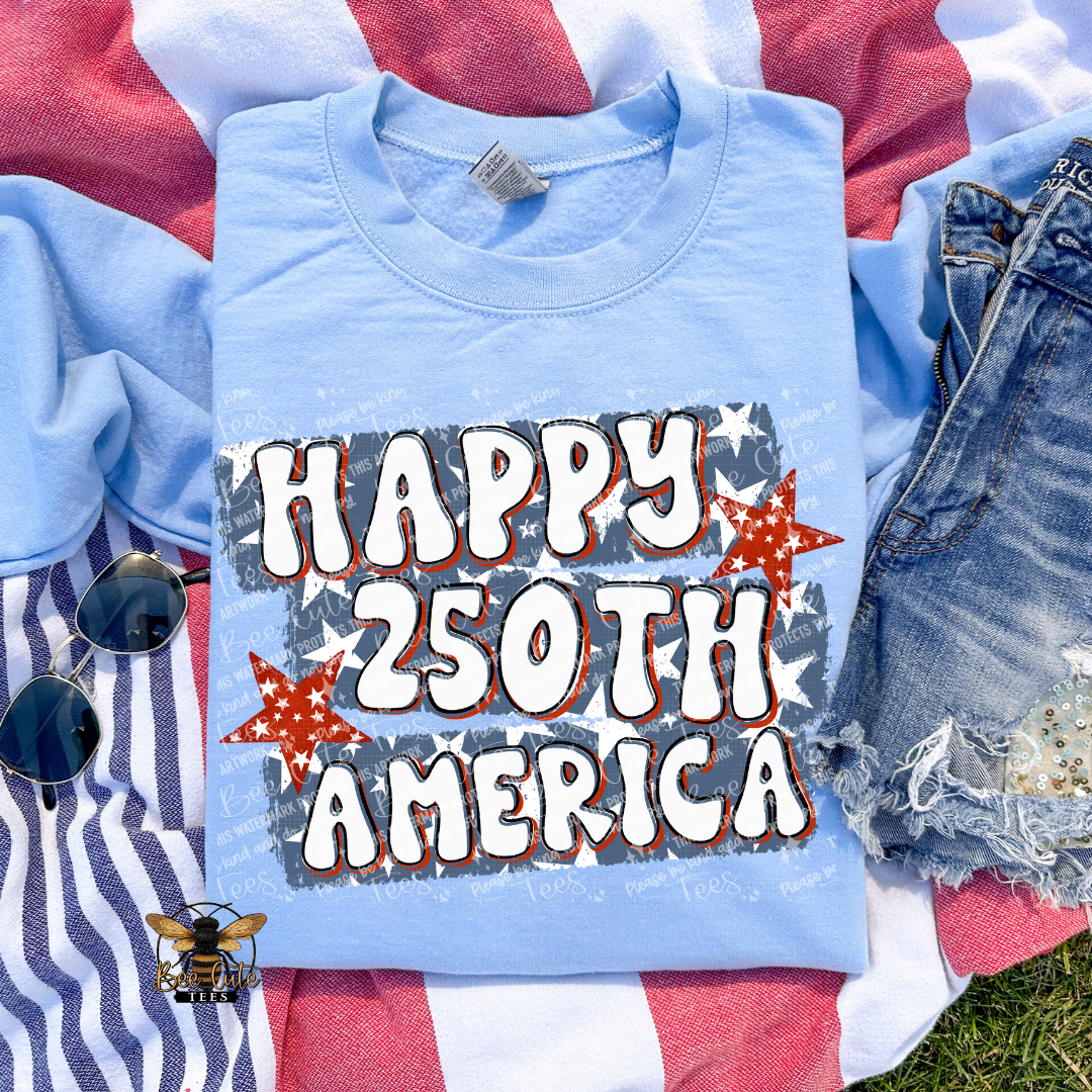 Light blue t-shirt with 'Happy 250th America' text on a flag background