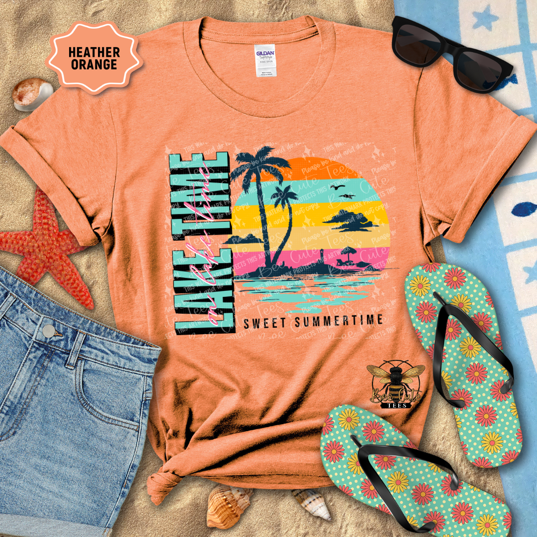 Orange t-shirt with beach graphic, sunglasses, denim shorts, and flip-flops on a sandy surface.