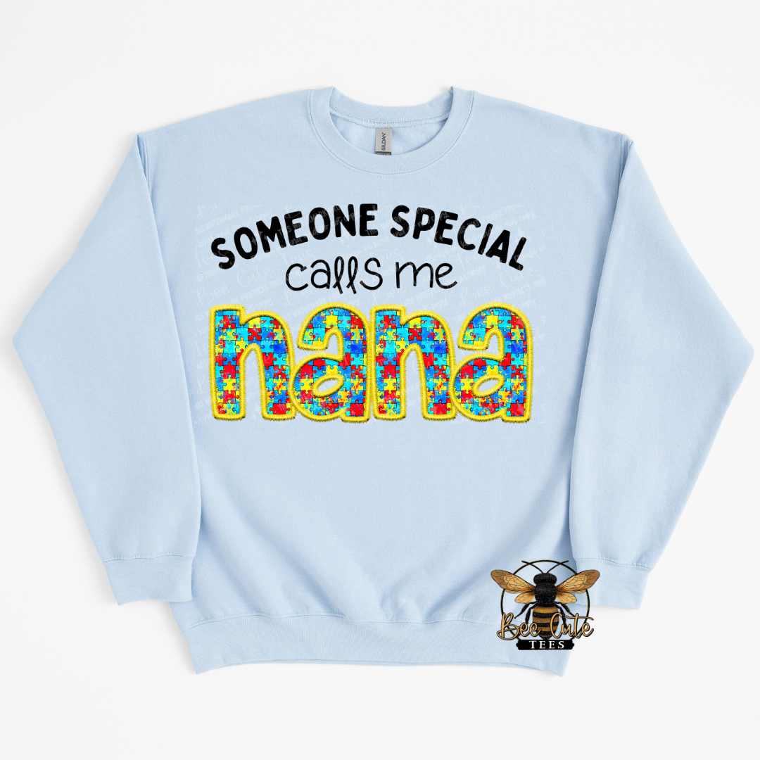 Light blue sweatshirt with colorful text 'Someone special calls me nana' on a white background
