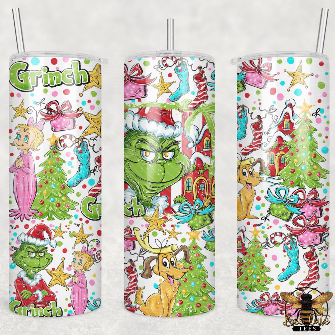 Three tall skinny tumblers with straws featuring a colorful Christmas-themed Christmas print, shown on a light gray background.