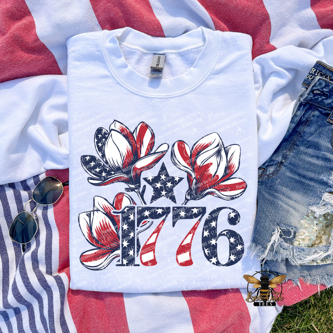 White t-shirt with 1776 design on a flag background