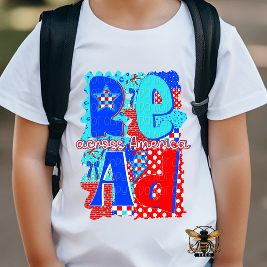 Person wearing a white t-shirt with colorful text and graphics, carrying a black backpack.