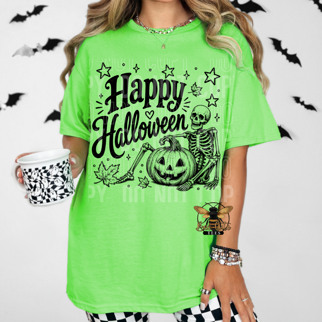 A woman wearing a bright lime green t-shirt with a black 'Happy Halloween' graphic featuring a skeleton and jack-o'-lantern. She is holding a black and white patterned mug against a white background decorated with black bat silhouettes.