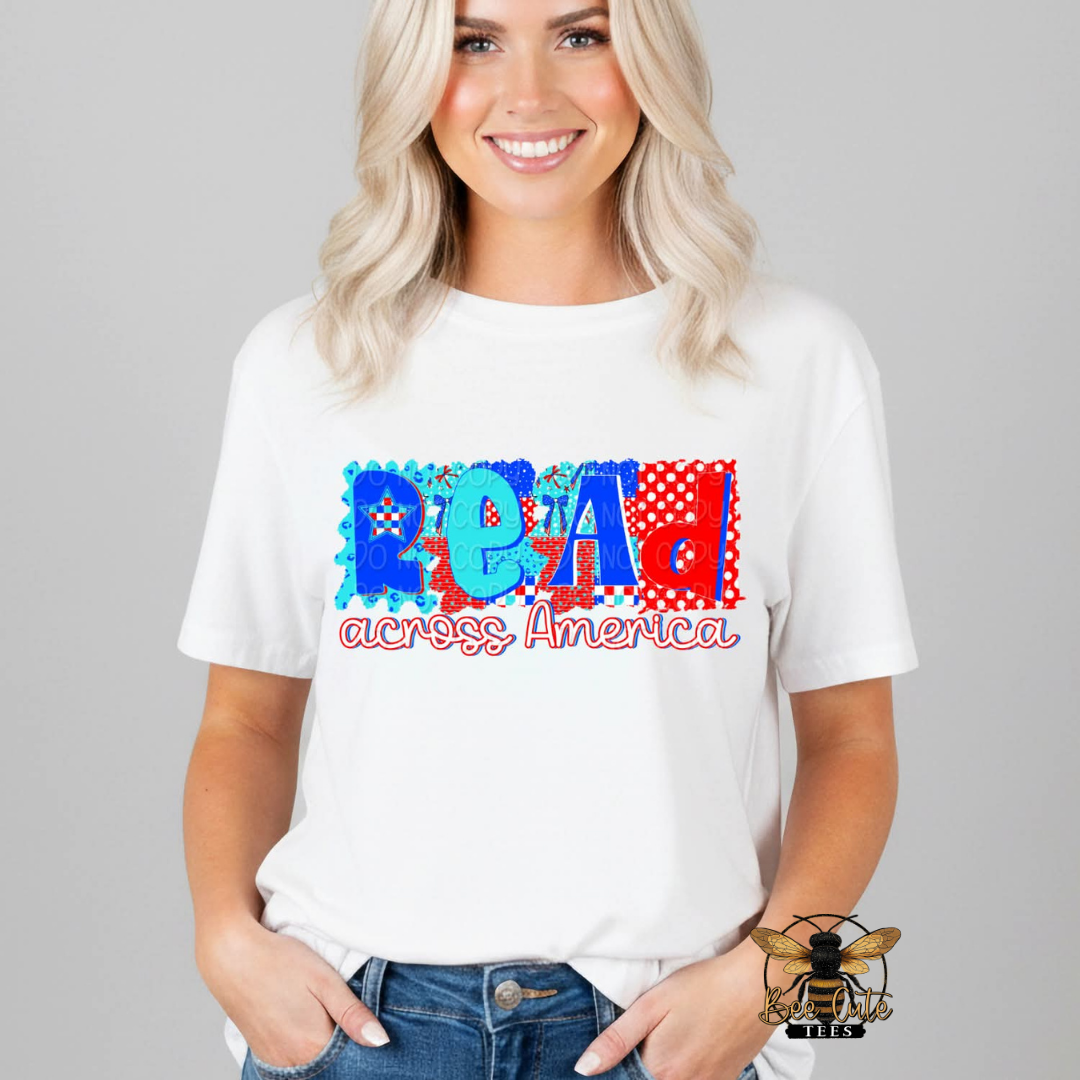 Woman wearing a white t-shirt with colorful text design on a gray background