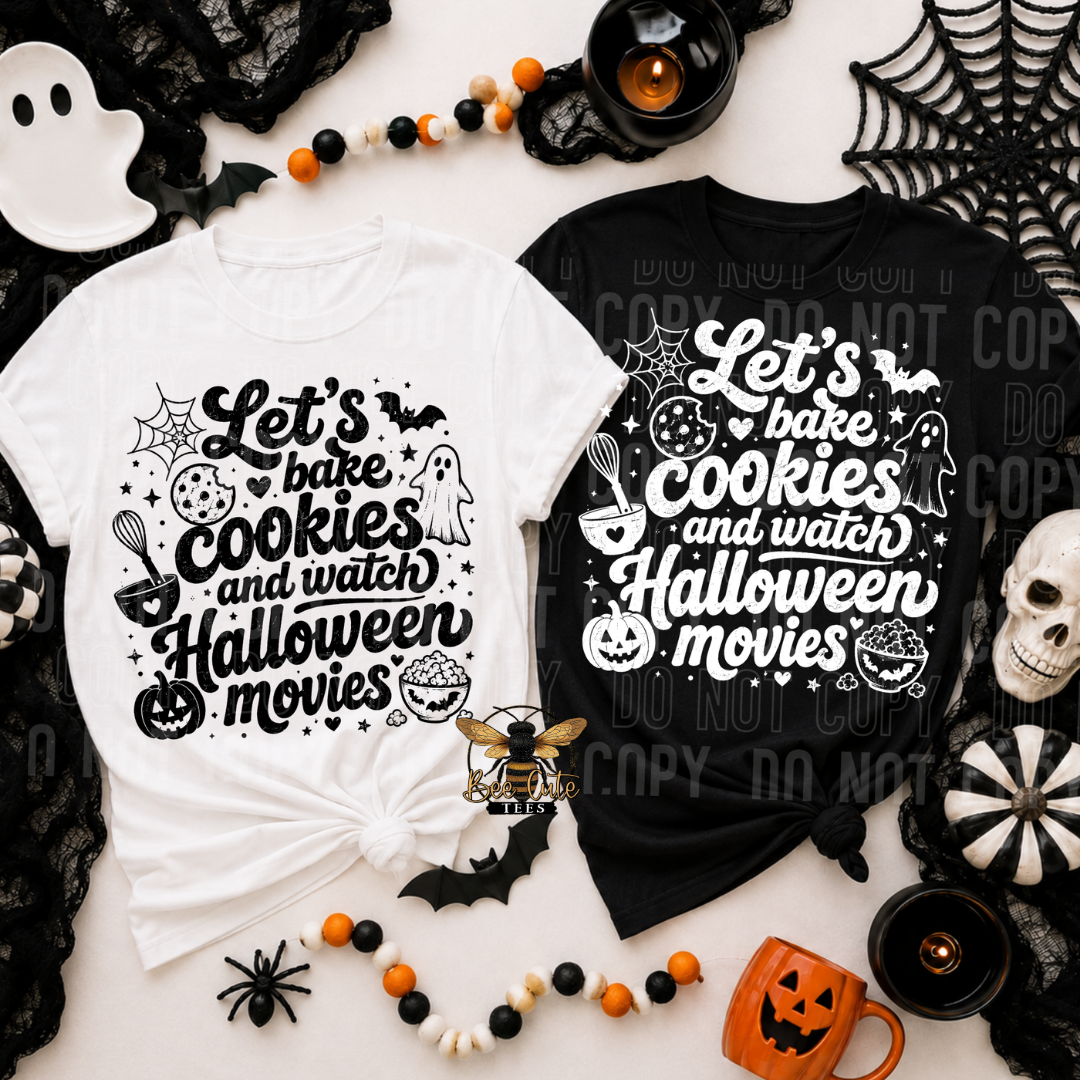 Two Halloween-themed graphic T-shirts laid flat on a light surface with spooky props. The left shirt is white with black text reading 'Let's bake cookies and watch Halloween movies' and black spider, bat, ghost, pumpkin, and witch illustrations.