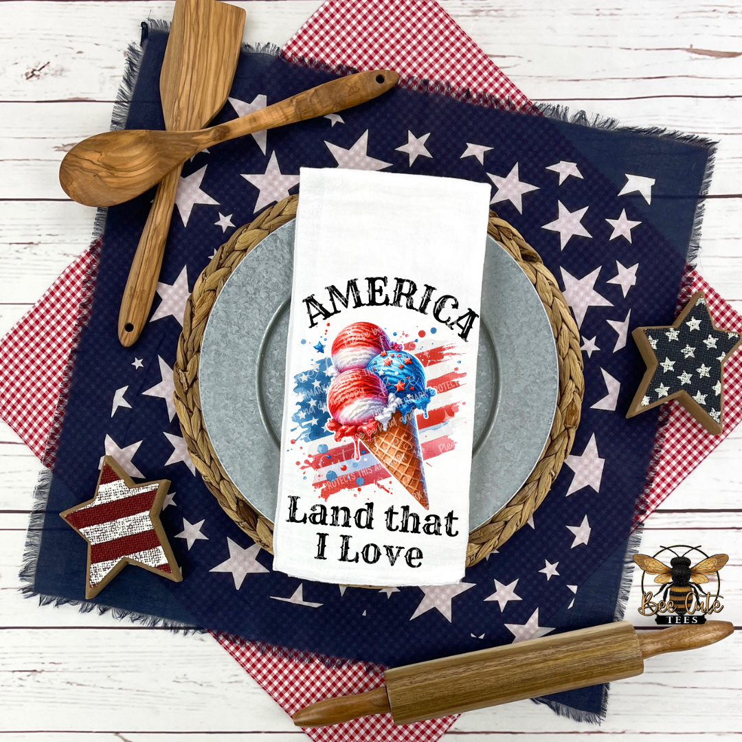 Placemat with ice cream cone design and 'America Land that I Love' text on a red, white, and blue checkered tablecloth.