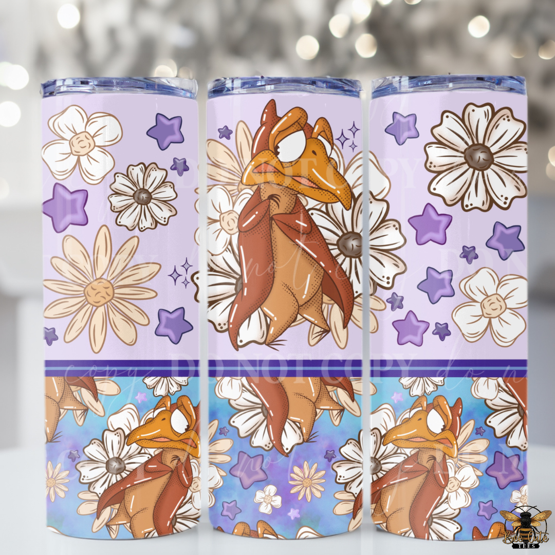Three tumblers with floral and animal design on a gradient background
