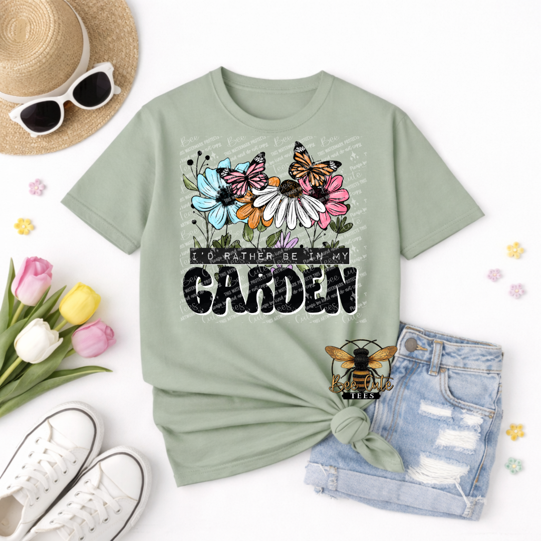 Mint green t-shirt with floral and butterfly design, sunglasses, hat, tulips, and shorts on a white background