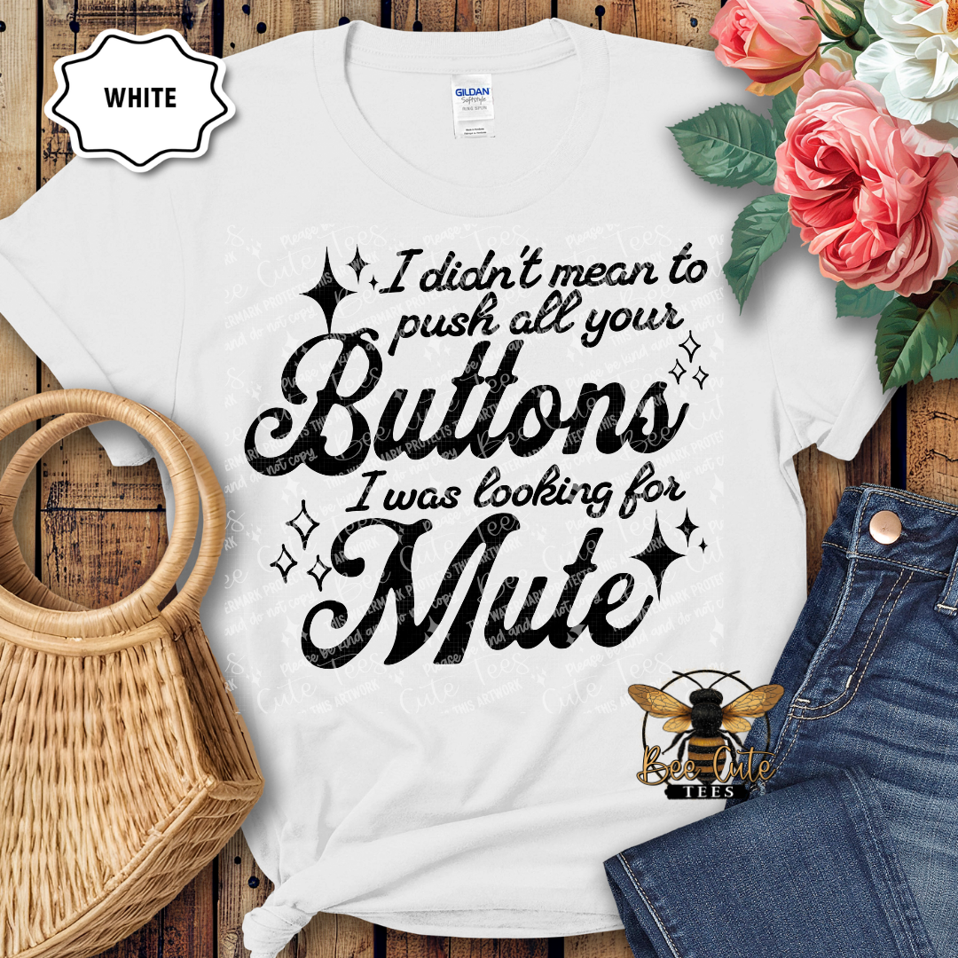 White t-shirt with humorous text design on a wooden surface with flowers and jeans.