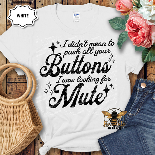 White t-shirt with humorous text design on a wooden surface with flowers and jeans.
