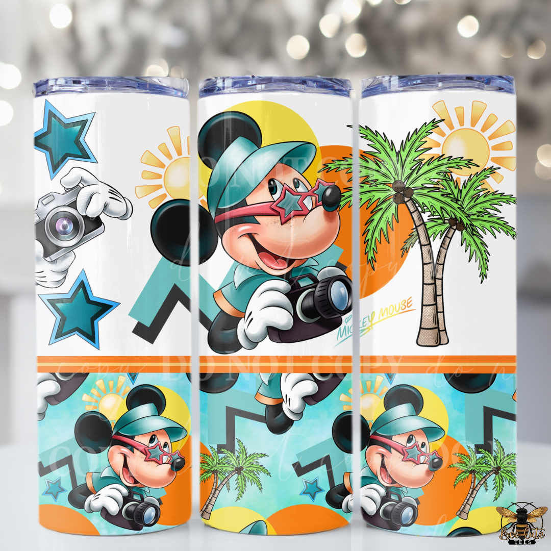 Three tumbler designs featuring a cartoon character with a camera, stars, and palm trees on a white background.
