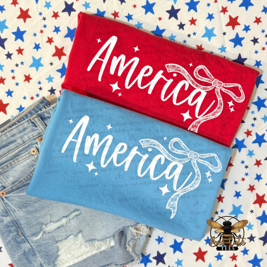 Two towels with 'America' text on a star-patterned background