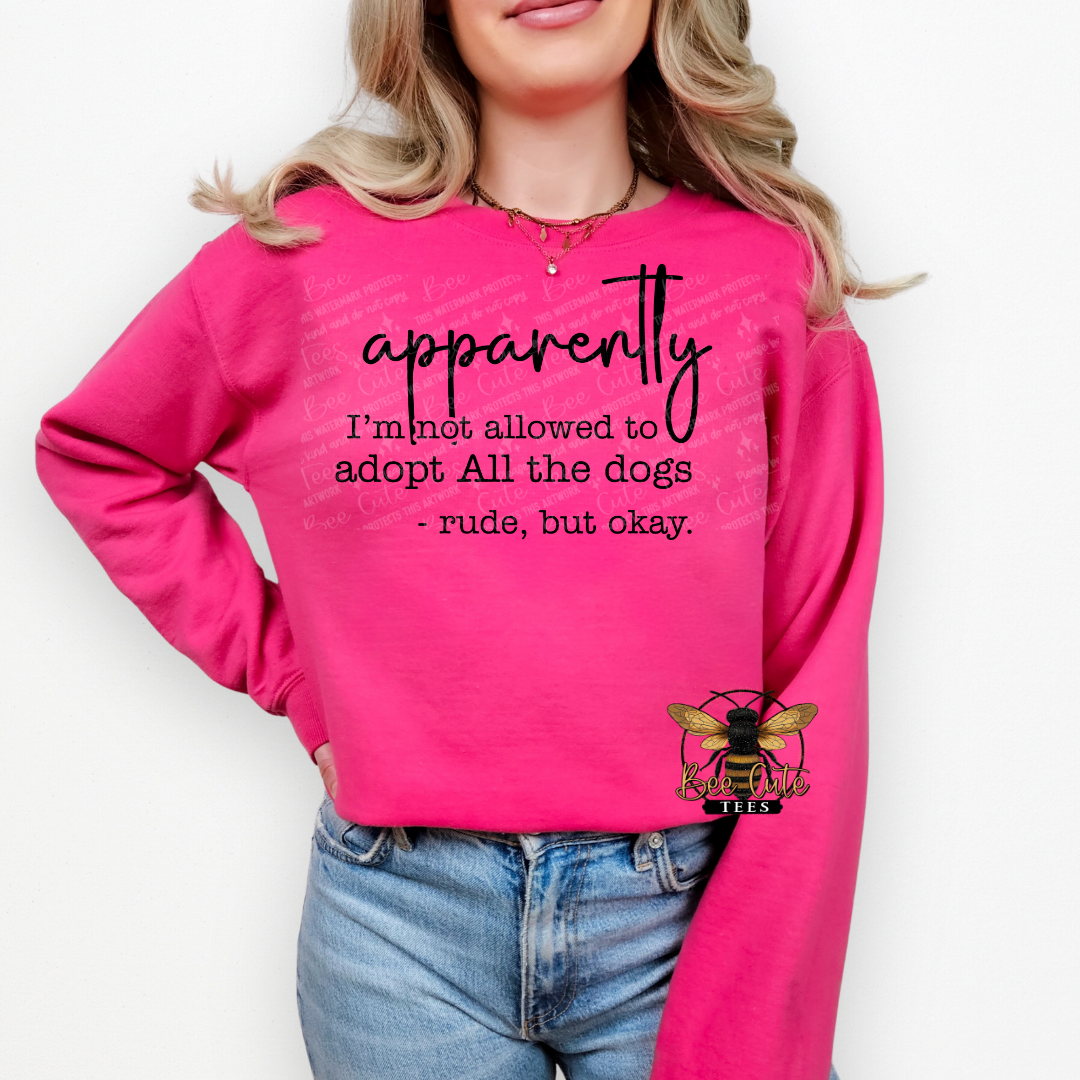 Person wearing a pink sweatshirt with text and a bee logo on a white background