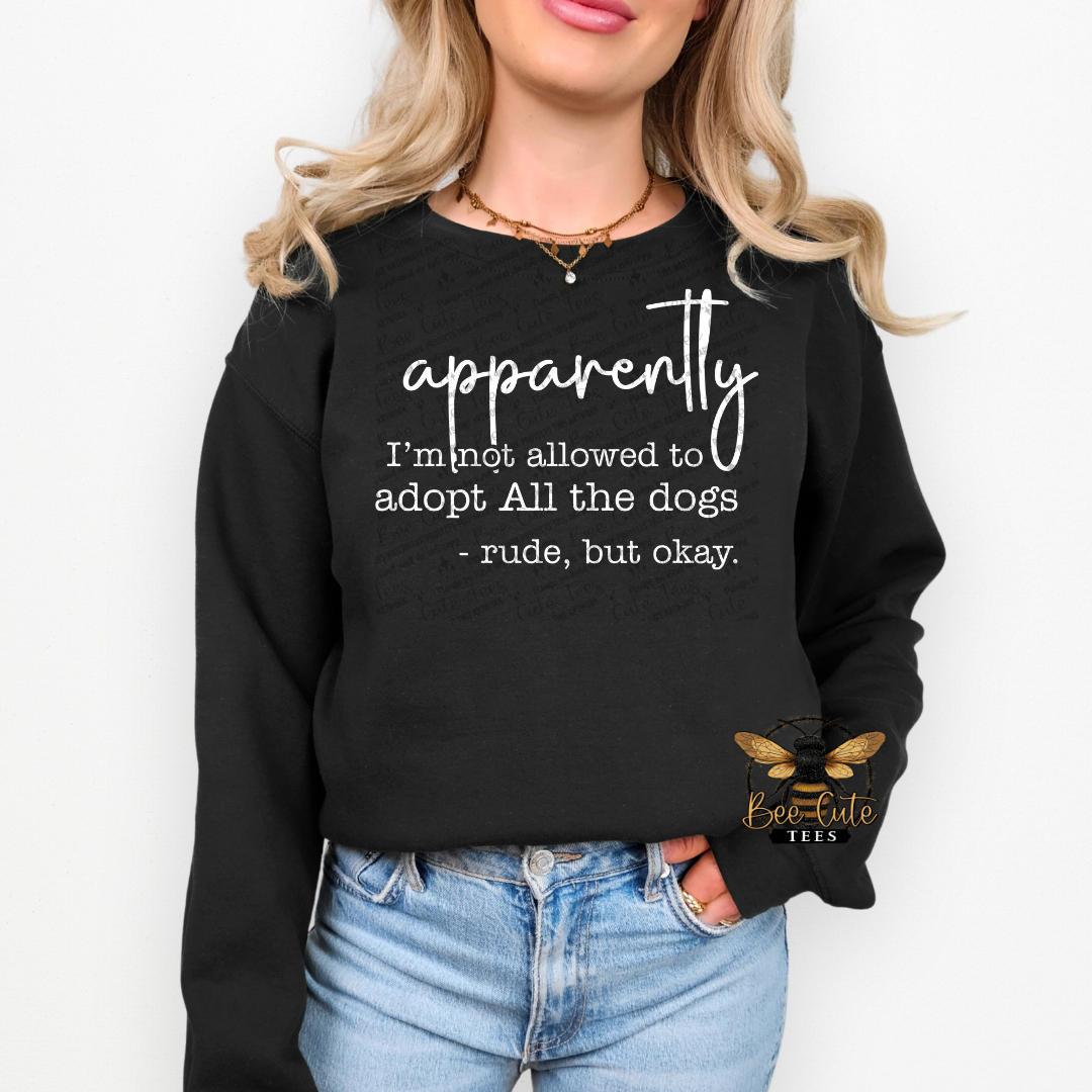 Person wearing a black sweatshirt with text, standing against a white background