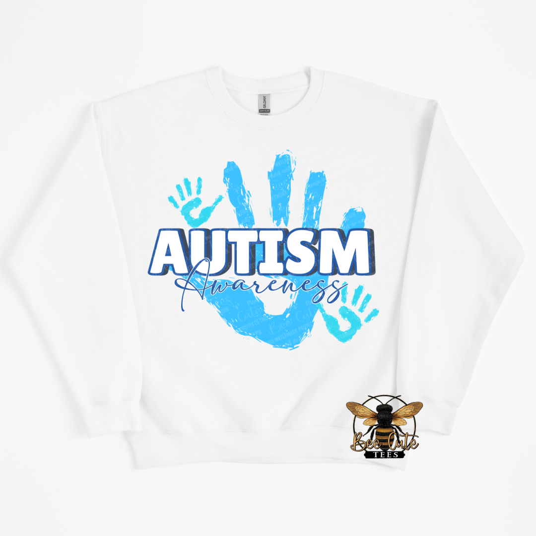 White sweatshirt with blue 'Autism Awareness' design on a white background