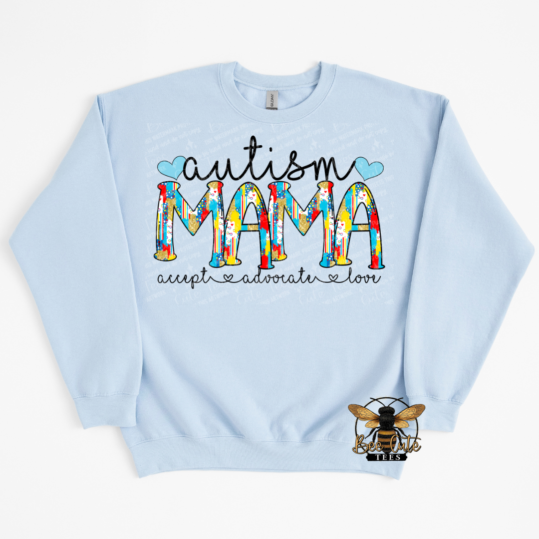 Light blue sweatshirt with 'autism MAMA accepts and advocates for' text on a white background