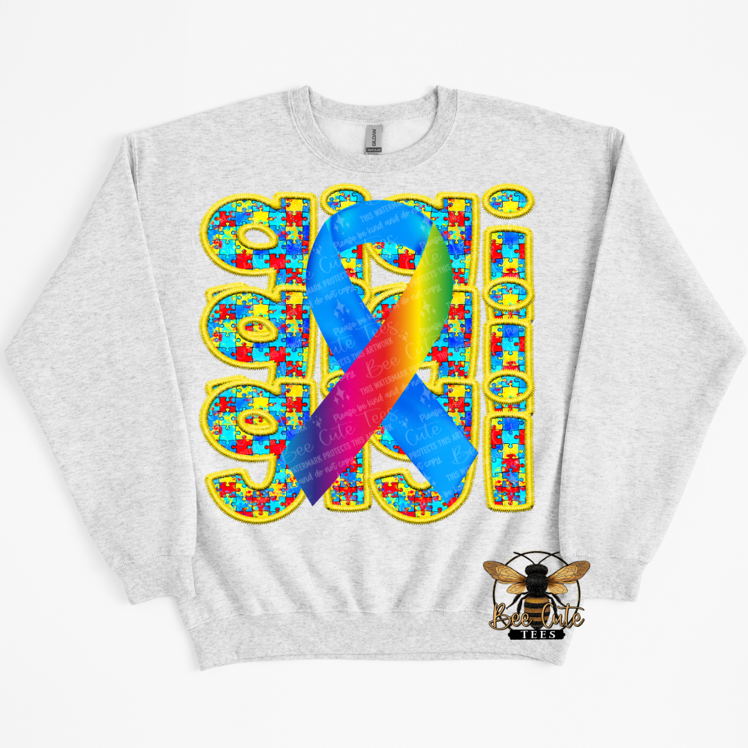 Gray sweatshirt with colorful design featuring a ribbon and text on a white background