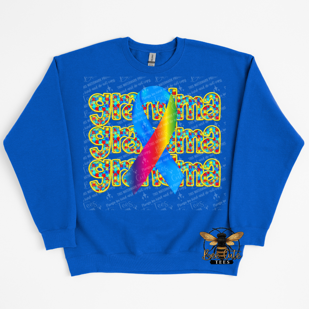 Blue sweatshirt with colorful design and text on a white background