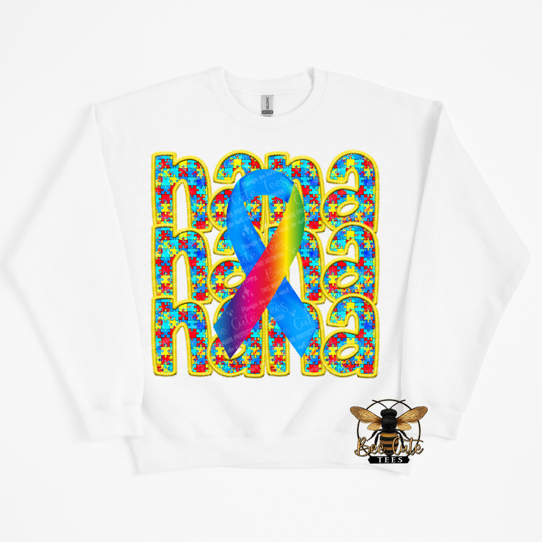 White sweatshirt with colorful design featuring a ribbon and text on a white background