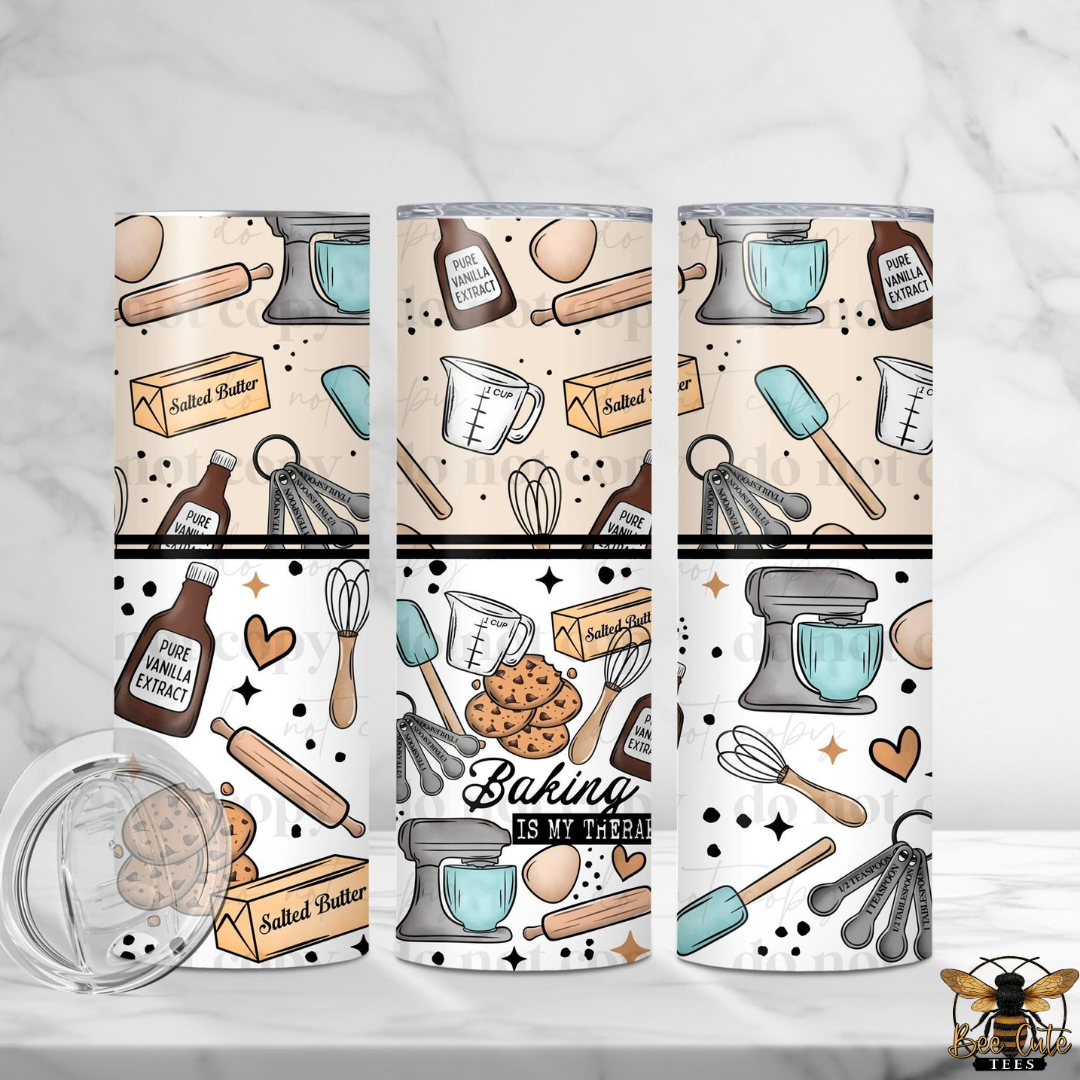Set of four tumblers with baking-themed designs on a white background