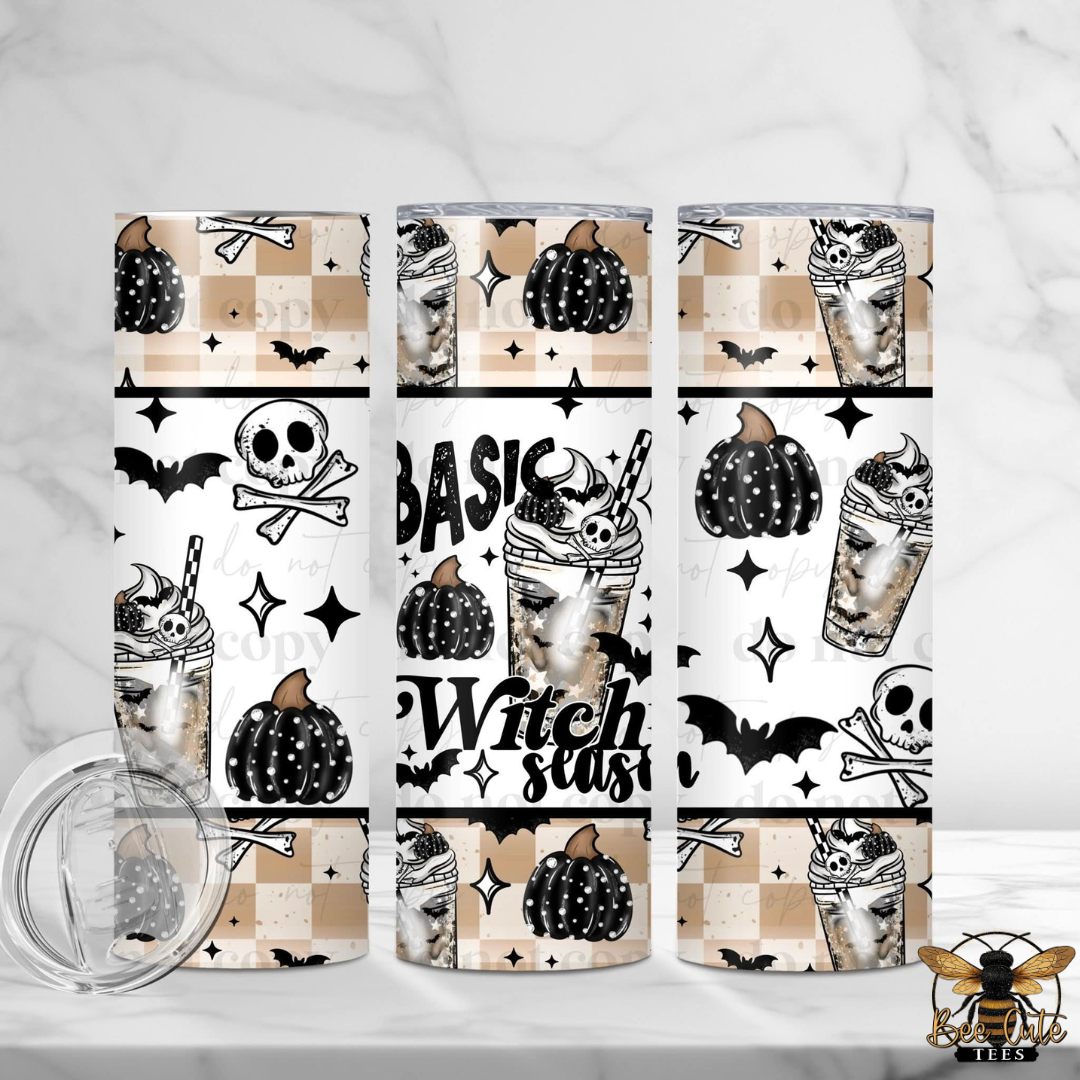 Three slim tumblers with a Halloween-themed 'Basic Witch Season' pattern, featuring pumpkins, skulls, bats, and witch hats on a beige and white checkered background. A clear lid is shown in the bottom left corner.