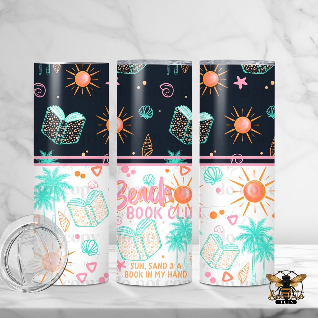 Three tumblers with beach-themed designs on a white background