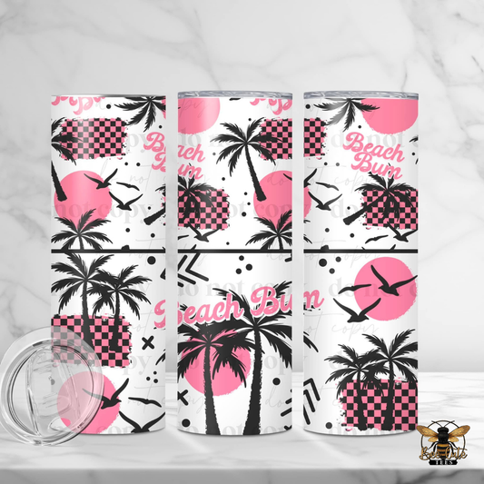 Three tumblers with beach-themed designs featuring palm trees, checkered patterns, and 'Beach Bum' text on a white background.