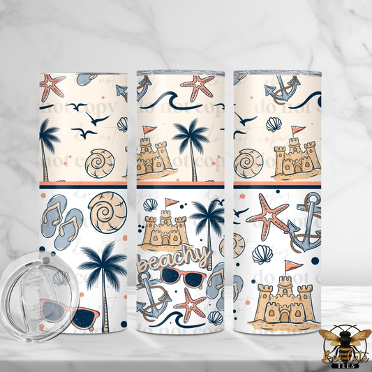 Three tumblers with beach-themed designs on a white background