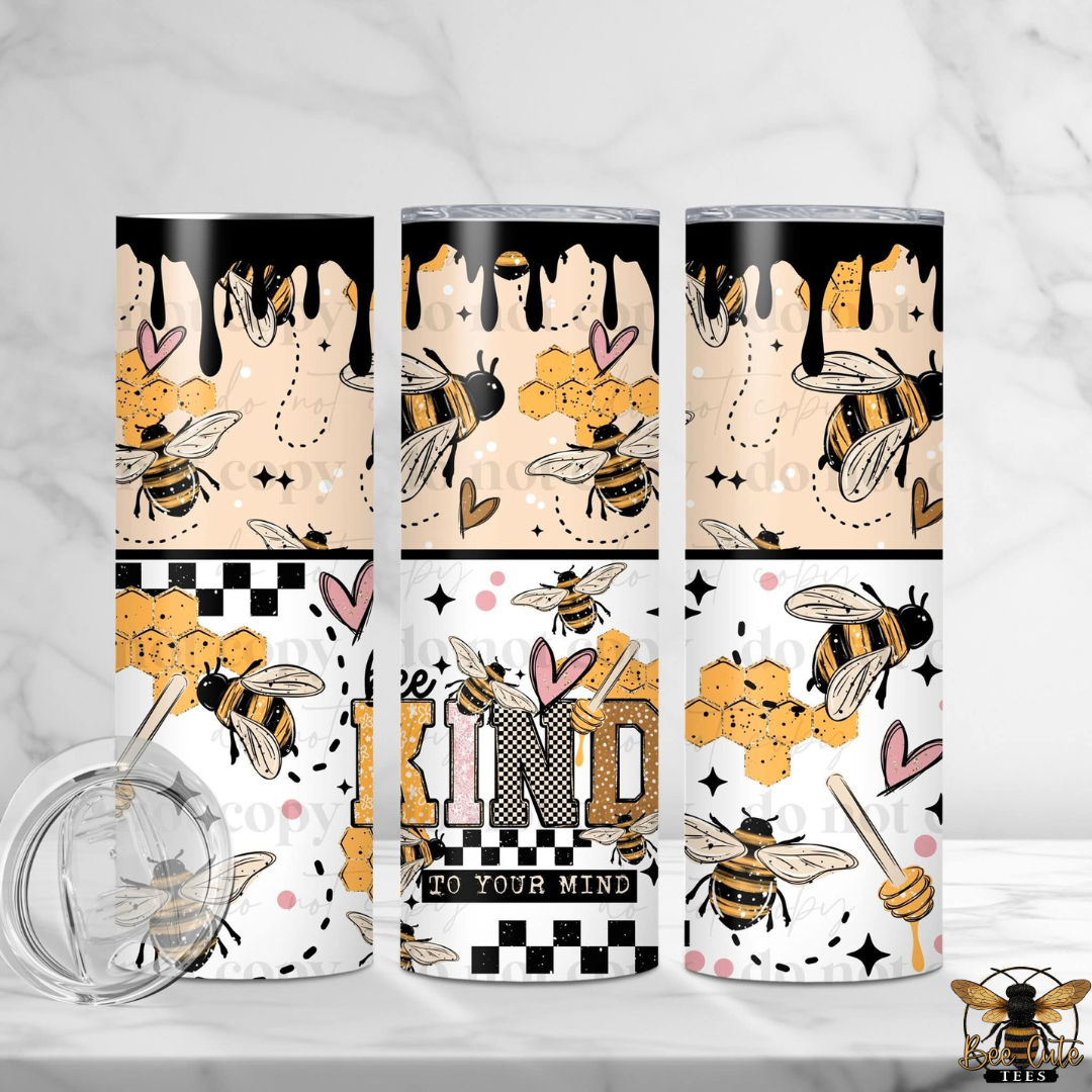 Three tumblers with bee-themed designs on a white background