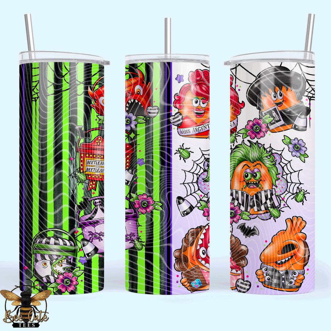 Three tall skinny tumblers with clear lids and straws, each featuring a colorful Halloween-themed graphic print. The designs include green and black stripes, spiderwebs, pumpkins, ghosts, flowers, and spooky characters.