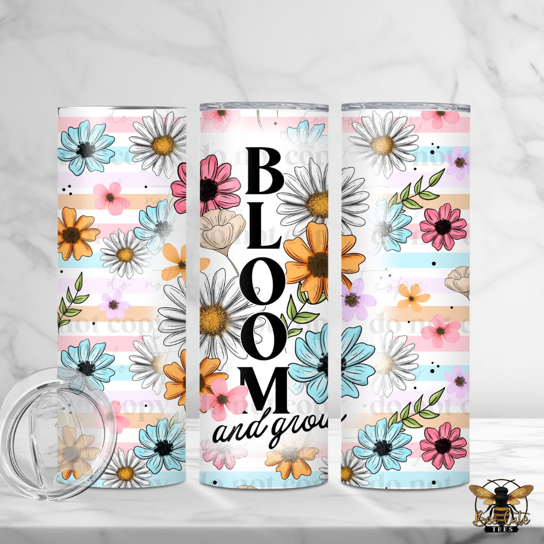 Three floral tumblers with 'Bloom and Grow' text on a white background