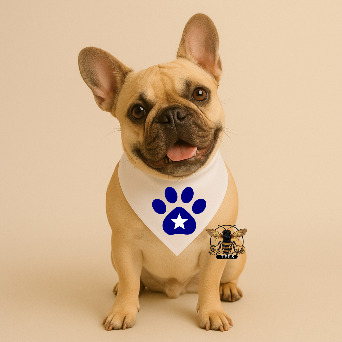 Dog wearing a bandana with a blue paw print design on a beige background