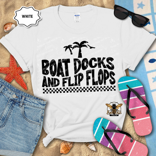 White t-shirt with 'Boat Docks and Flip Flops' text, sunglasses, and flip flops on a beach-themed background.