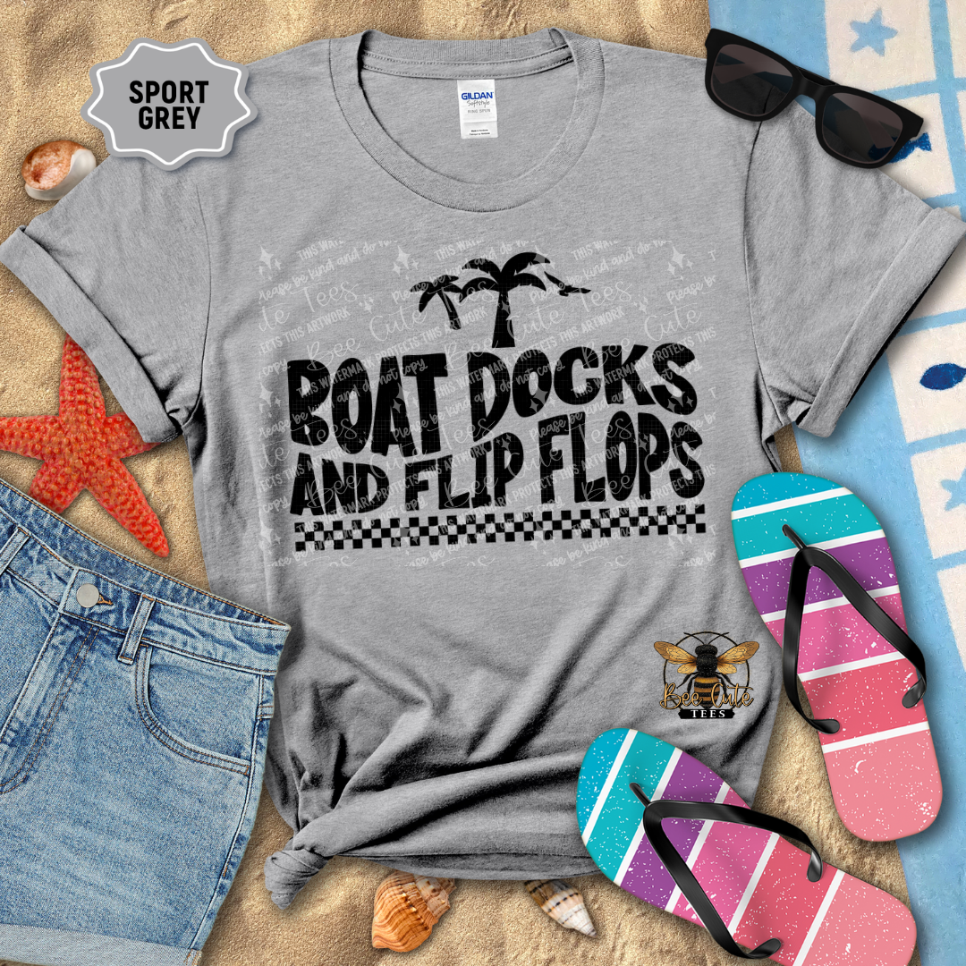 Gray t-shirt with 'Boat Docks and Flip Flops' text, sunglasses, and flip flops on a beach-themed background.