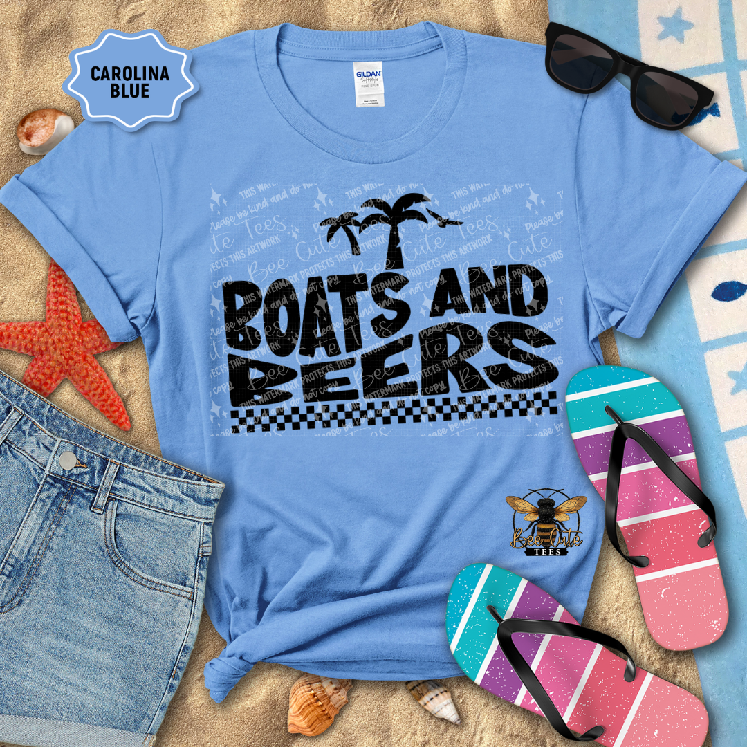 Blue t-shirt with 'Boats and Beers' text, sunglasses, and flip-flops on a sandy background
