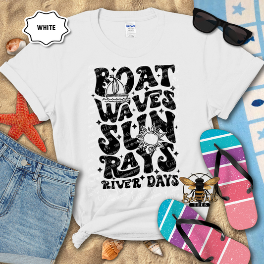 White t-shirt with black graphic design on a beach-themed background with sunglasses, flip-flops, and denim shorts.