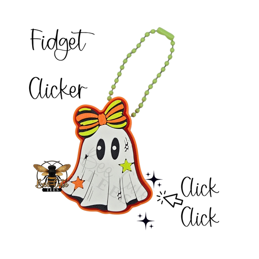 A Halloween-themed fidget clicker featuring a cute ghost character with a green and orange bow, a green bead chain, and star accents. The text 'Fidget Clicker' and 'Click Click' are displayed alongside a bee logo on a white background.