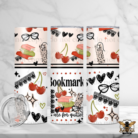 Three tumblers with decorative patterns featuring cherries, glasses, and text on a white background.