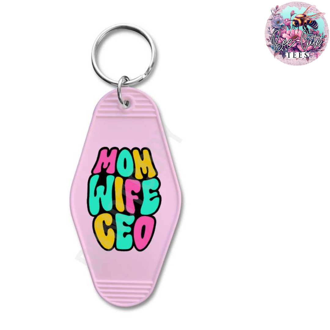 Pink keychain with 'Mom Wife CEO' text on a white background