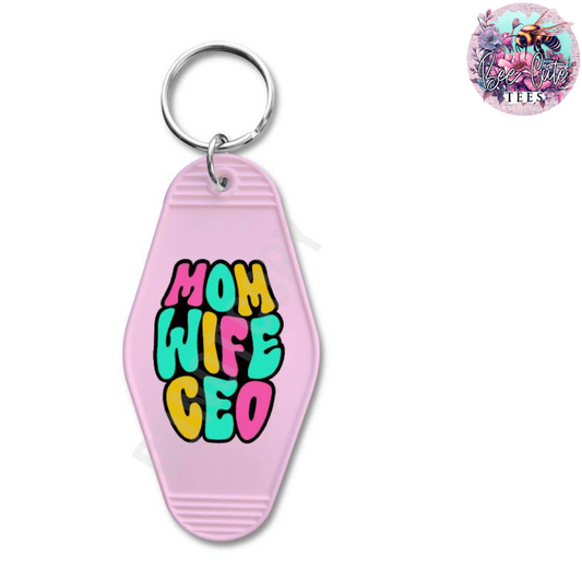Pink keychain with 'Mom Wife CEO' text on a white background