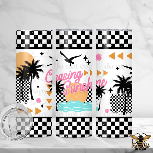Three tumblers with checkered patterns, palm trees, and text on a white background.