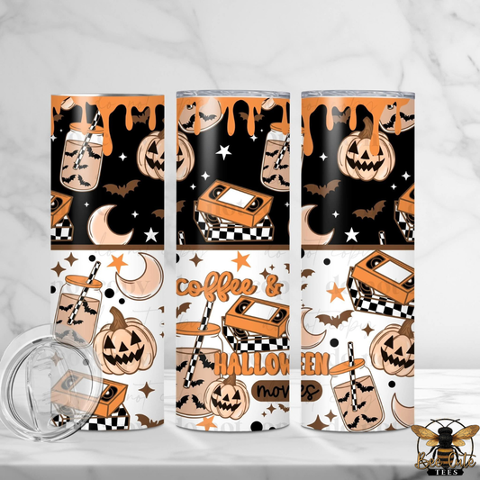 Three tall skinny tumblers with a Halloween-themed pattern are displayed on a white marble surface. The pattern features jack-o'-lanterns, mugs with straws, bats, stars, and the words 'Coffee & HALLOWEEN' on a black and white background.