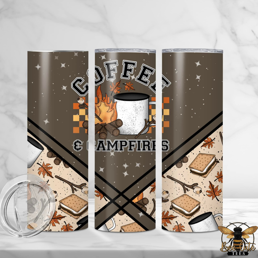20 oz stainless steel insulated tumbler featuring a cozy fall camping design in warm brown, cream, and orange tones. The wrap includes the phrase "Coffee & Campfires" with a campfire, enamel coffee mug, logs, autumn leaves, marshmallows, graham crackers, and s'mores scattered throughout. The tumbler is shown from multiple angles to display the full wrap design, with a clear sliding lid placed beside it.
