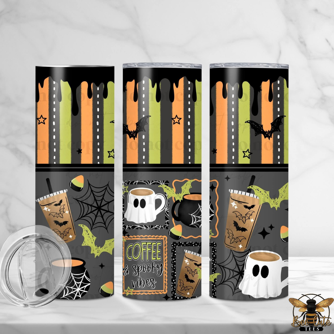 Three tall skinny tumblers with Halloween-themed wraparound prints are displayed on a white marble surface with a marble background. The design features orange and green vertical stripes with black dripping accents, black bats, spiderwebs, a ghost mug, a pumpkin, and a sign that reads 'COFFEE & SPooky VIBES'.