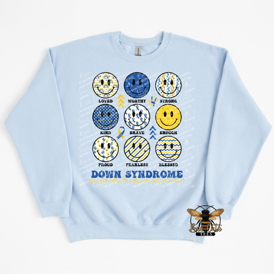 Light blue sweatshirt with smile face graphics and text on a white background