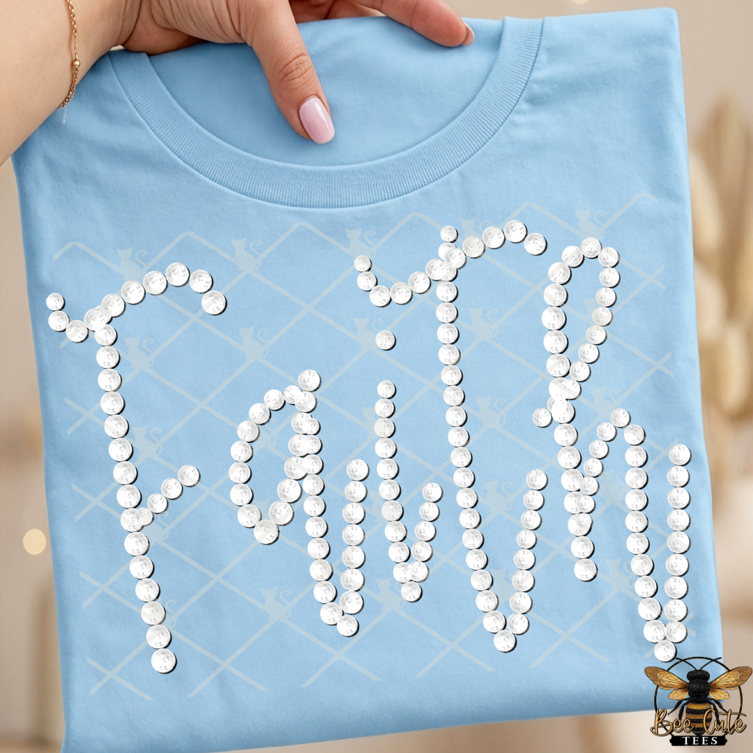 Light blue t-shirt with 'Faith' spelled out in faux white pears held by a hand.